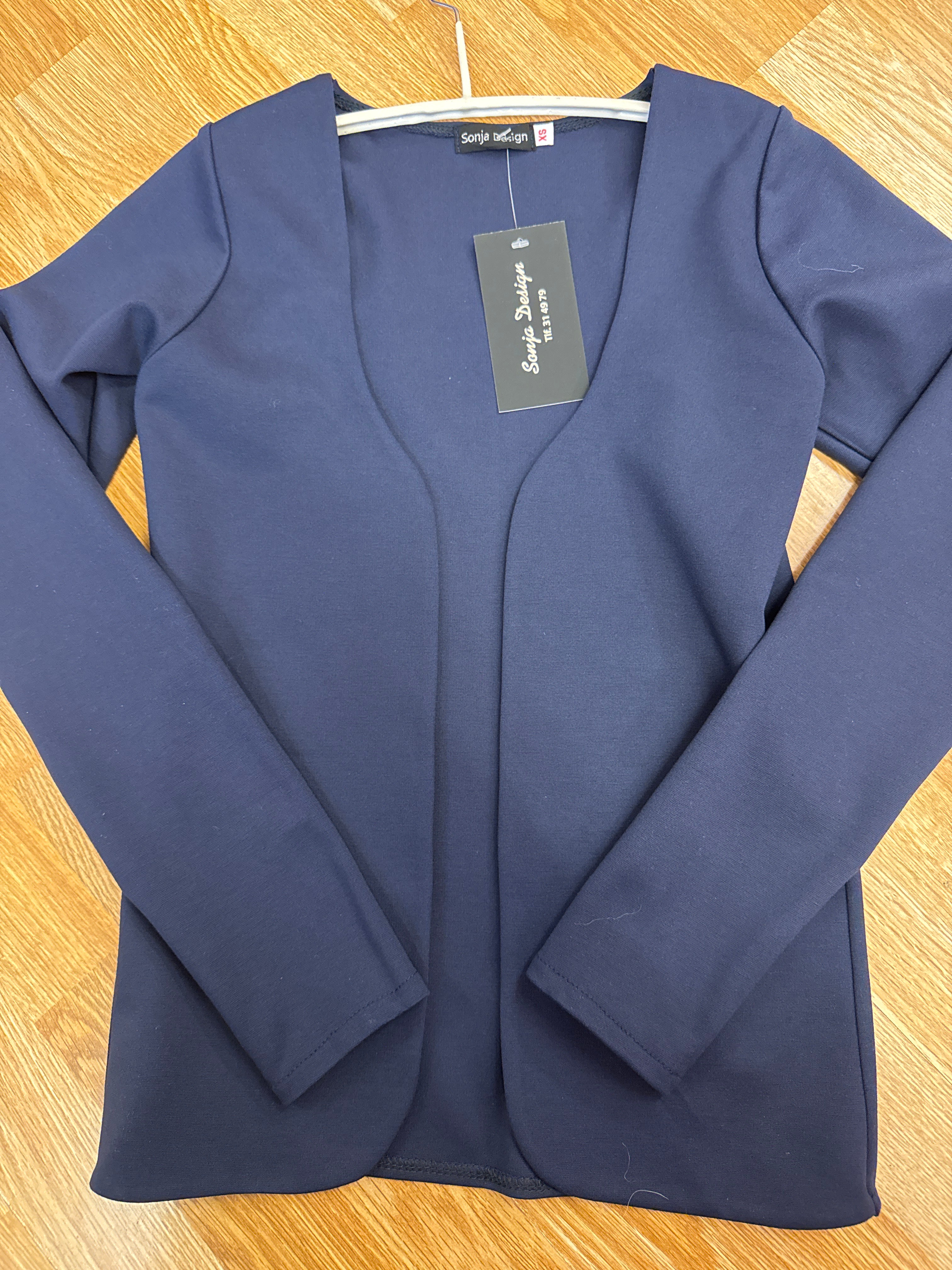 Kvinnutroyggja til føroysk klæðir