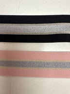 Elastik svart og rosa stríput 40 kr mtr.